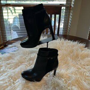 Antonio Melani suede and black boots.